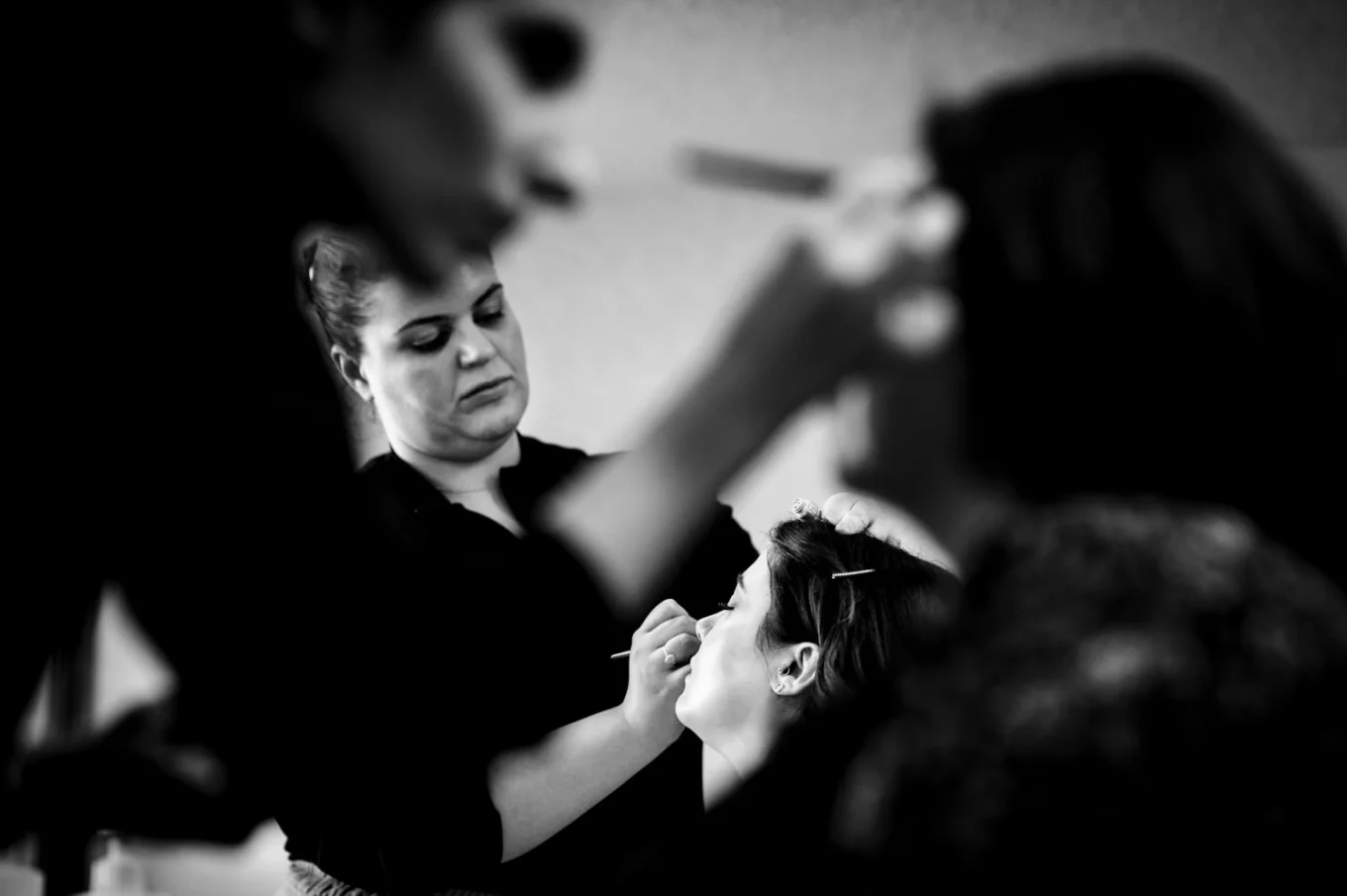 Bride and her bridesmaid get make-up done before Banff Wedding.