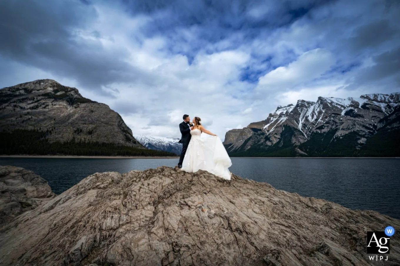 Wedding Portrait session at minnewanka Lake captured by best Banff wedding Photographer.