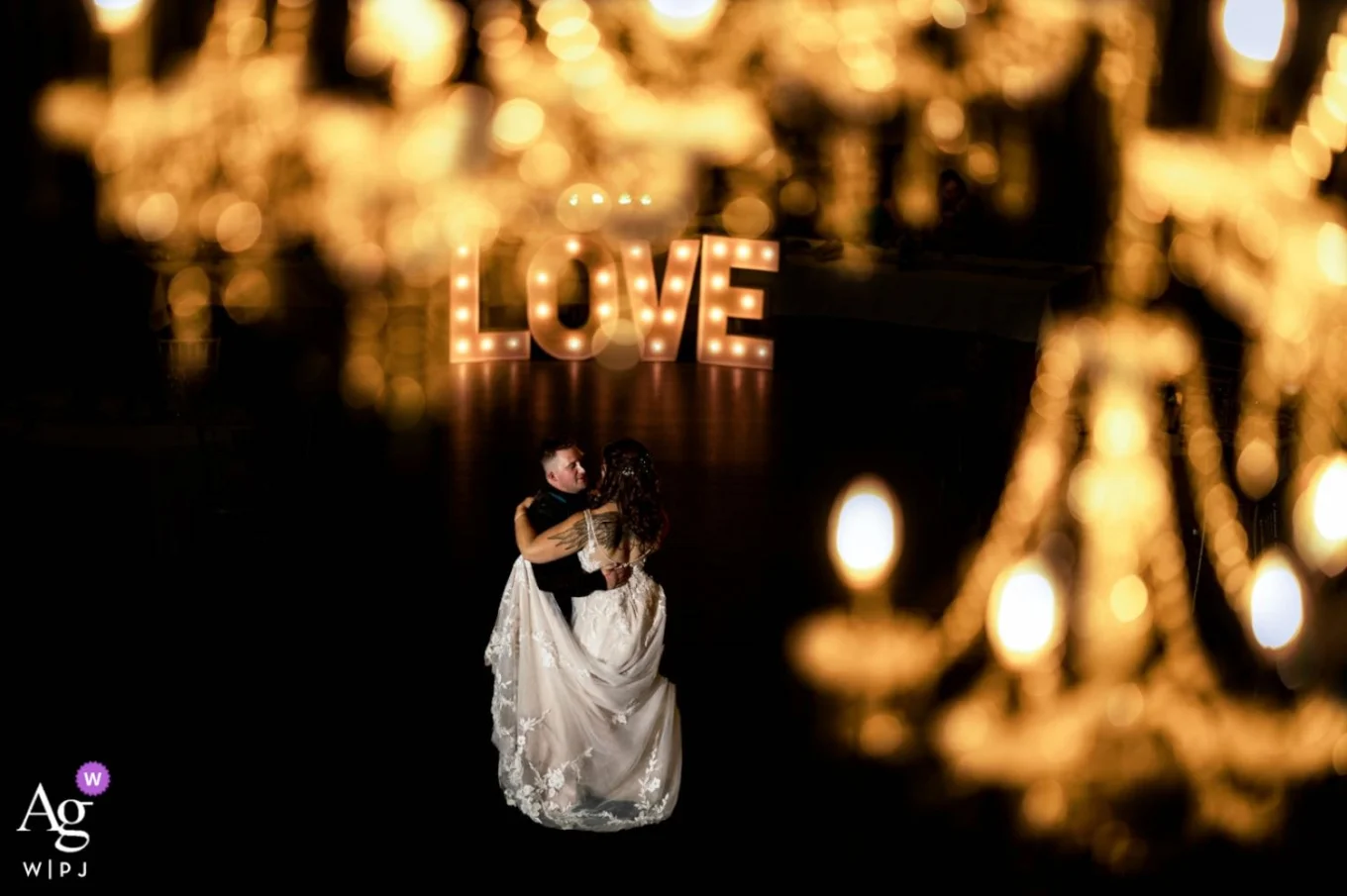 First Dance Through The Chandelier captured by Calgary Wedding Photographer