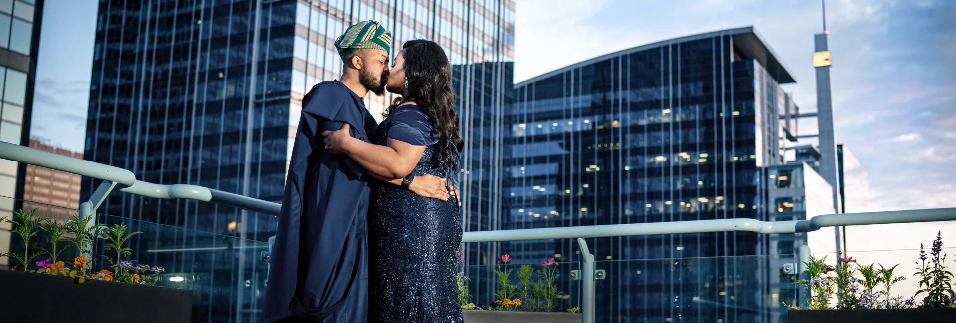 Newlyweds share a kiss on the Sheraton's balcony in Calgary.