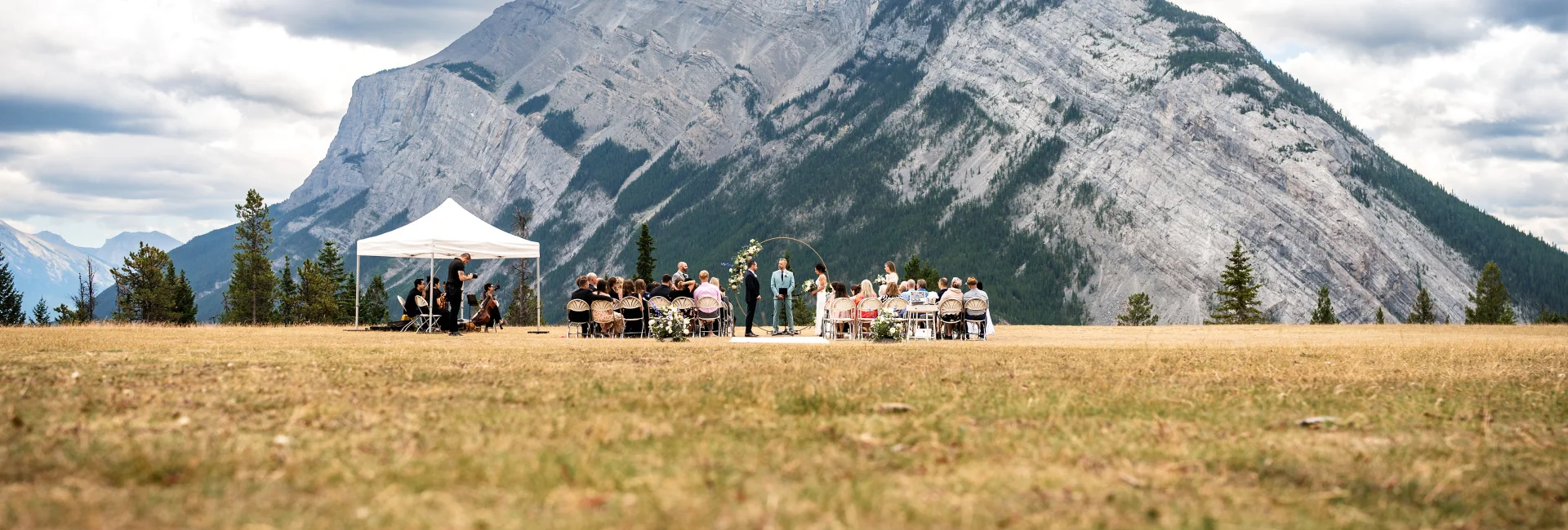 Bride and groom during wedding ceremony in Banff