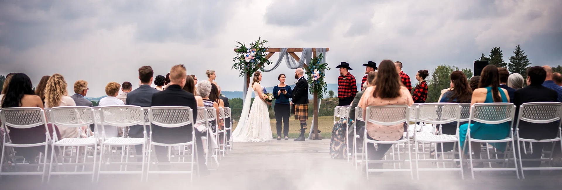 Bride and groom exchange the vows during wedding ceremony