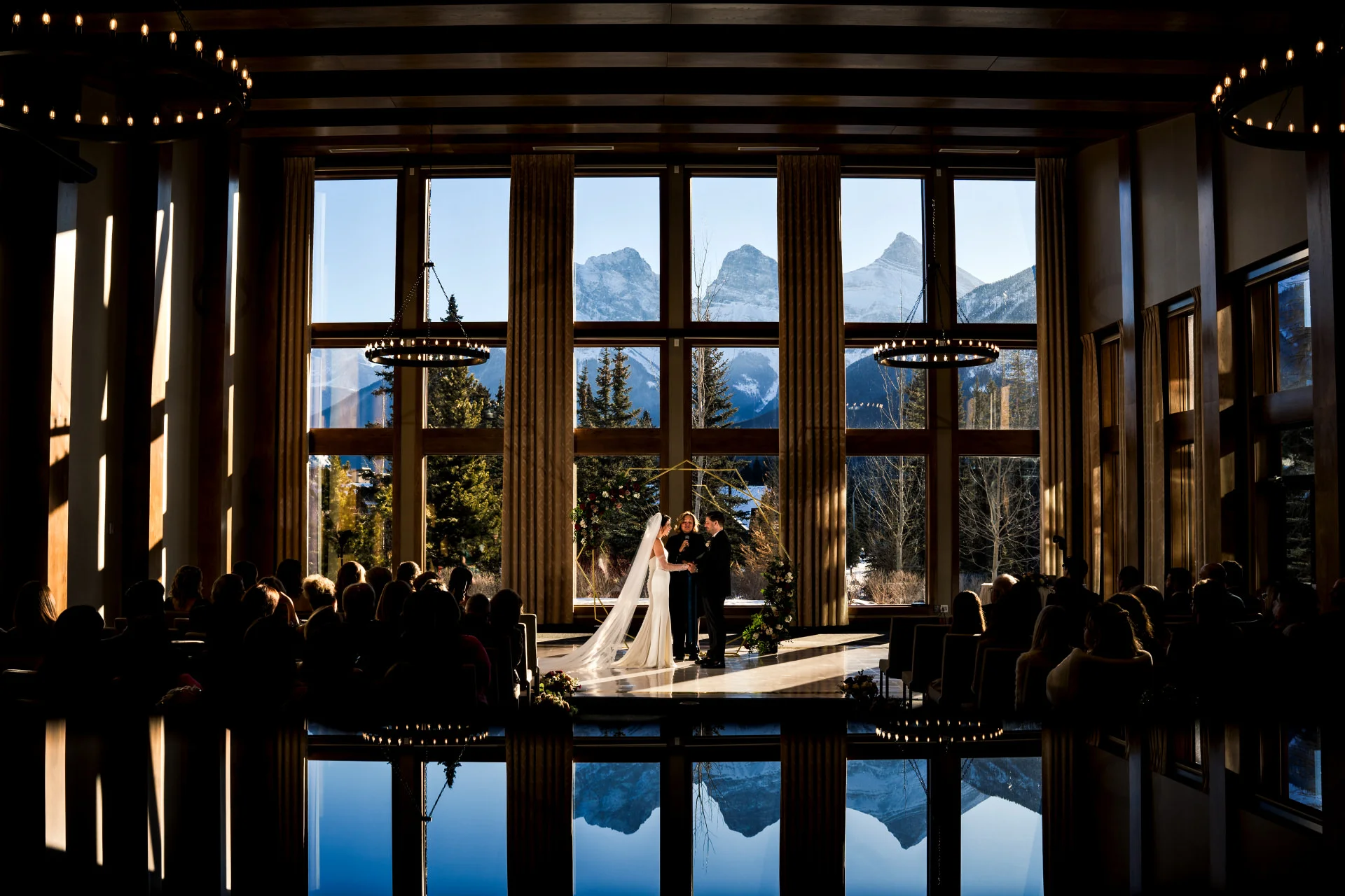 Canmore Wedding Ceremony in the Malcom Horel with the stunning view of the Rocku Mountains.