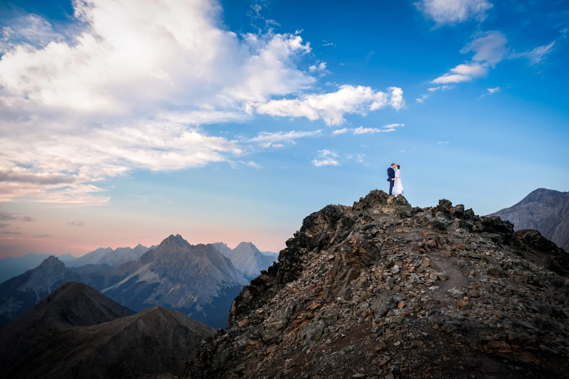 Banff Adventure Photography of the bride and groom at the top of the mountain