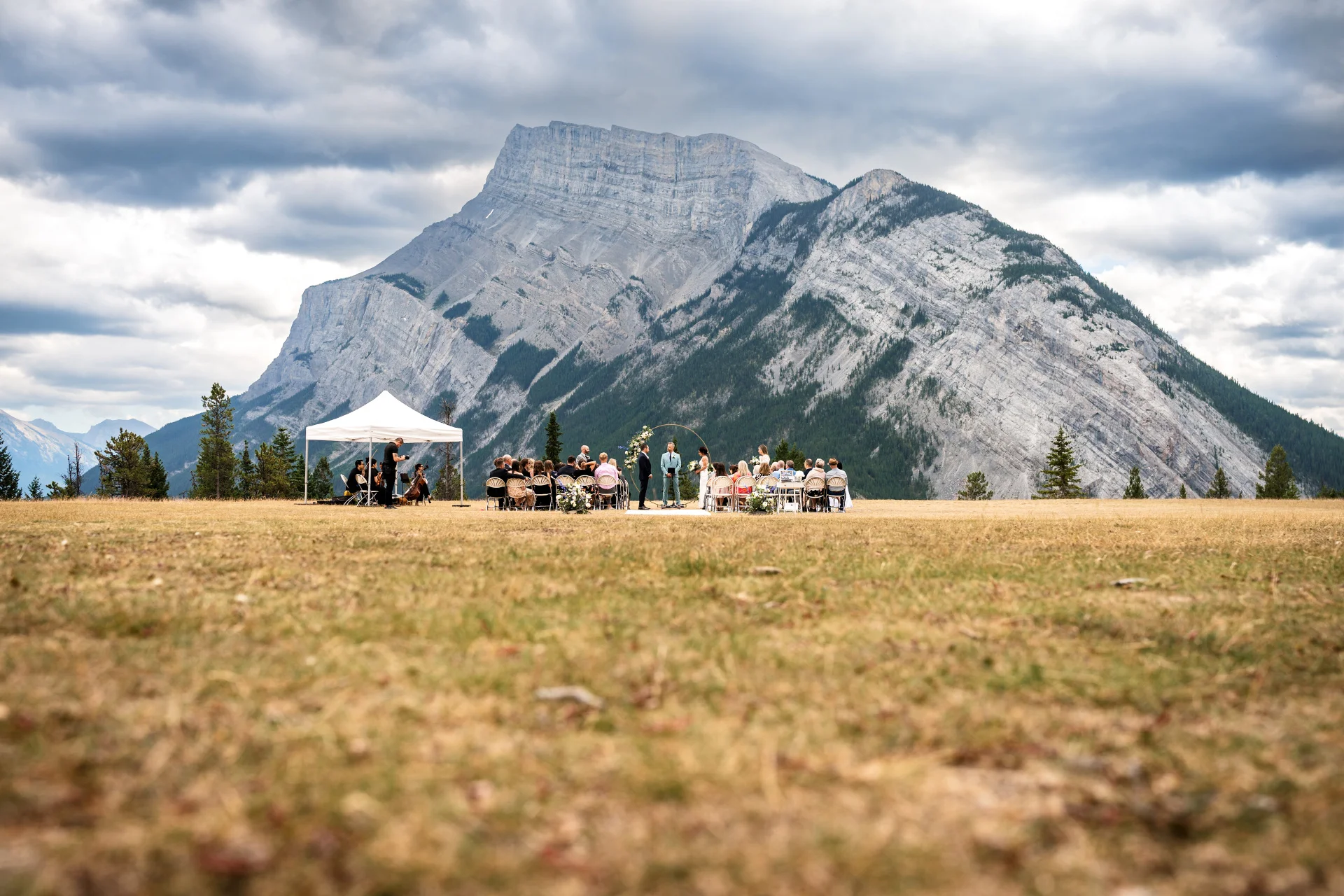 Bride and groom during wedding ceremony in Banff