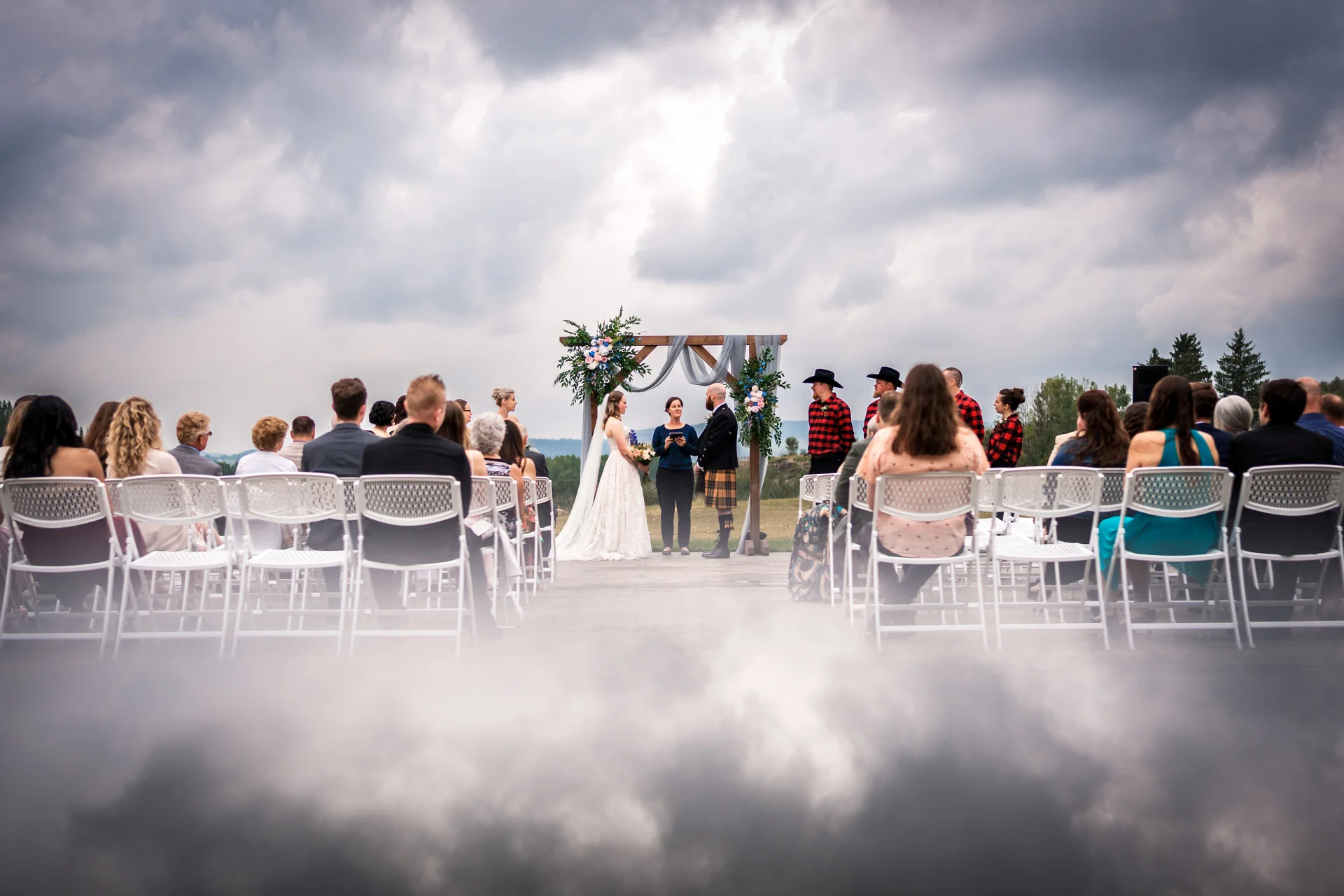 Bride and groom exchange the vows during wedding ceremony