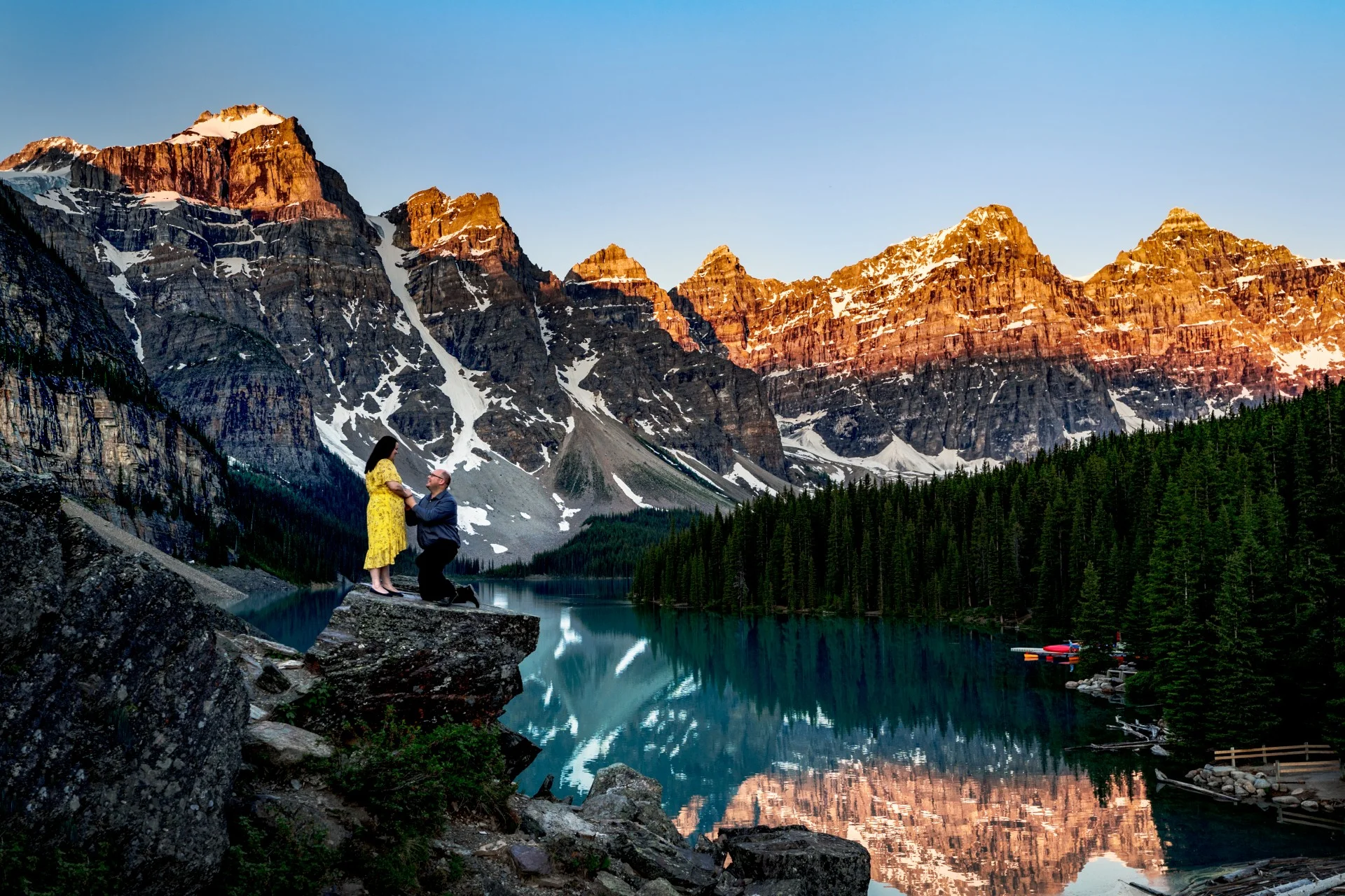 Romantic Proposal at Moraine Lake captured by Baff Wedding Photographers