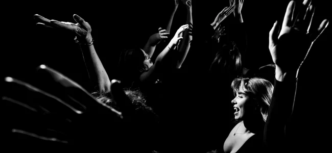 Bridesmaid dances during wedding reception in Banff