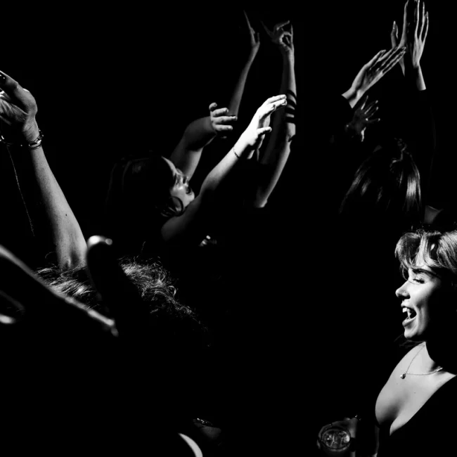 Bridesmaid dances during wedding reception in Banff