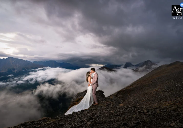 Bride and groom at the top of the mountain