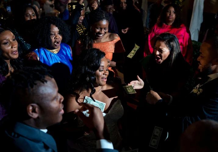 Traditional Nigerian Dance During the wedding when people spray money on the bride