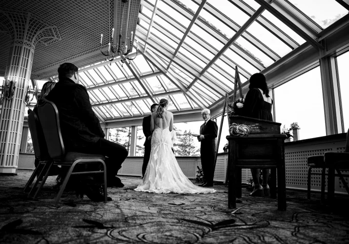 Banff Wedding Photography at the Wedding Ceremony in conservatory room at Fairmont Hotel in Banff.