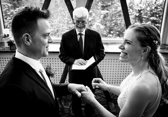 Banff Wedding Photography of the moment of exchanging wedding rings.