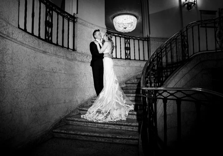 Unique Banff Wedding Portrait of the newlyweds standing on the stairs.
