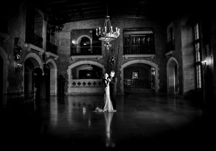 Newlyweds dance at the ball room in Banff Fairmont Hotel. Moment captured by Eliza Slobodzian - Banff Wedding Photographer.
