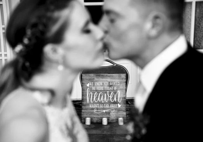 Bride and groom share a kiss at the Banff Wedding Ceremony.