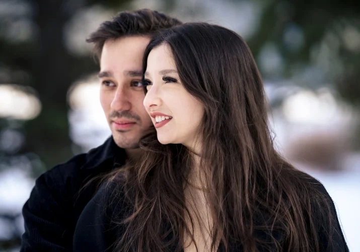 Portrait of the couple looking at the same direction.