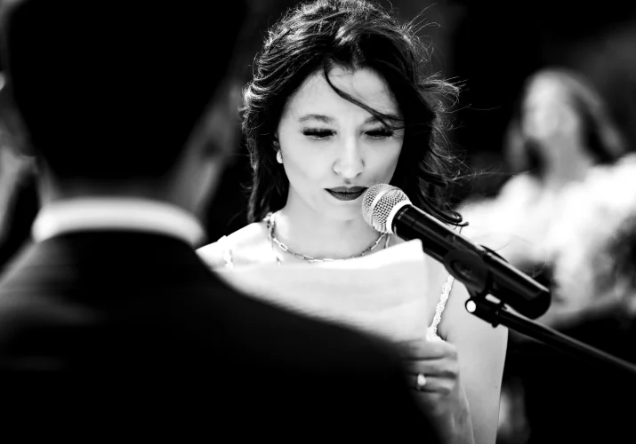 The bride speech to the microphone on the wedding ceremony in Calgary