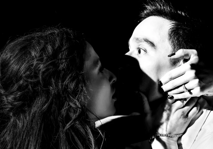 Bride surprise the groom with the kiss.
