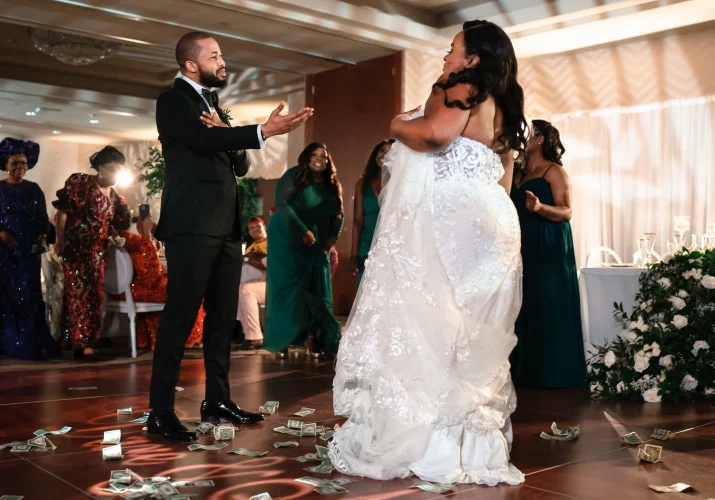Groom put his hand on tis heart and sing a song to his new wife during the first dance in Sheraton in Calgary.