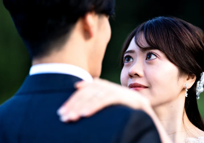 Bride look into her husband with love and passion.