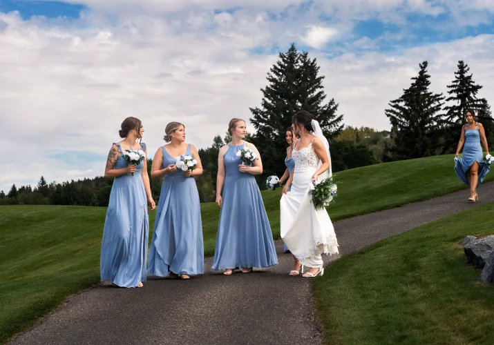 Bridal party walk and talk.