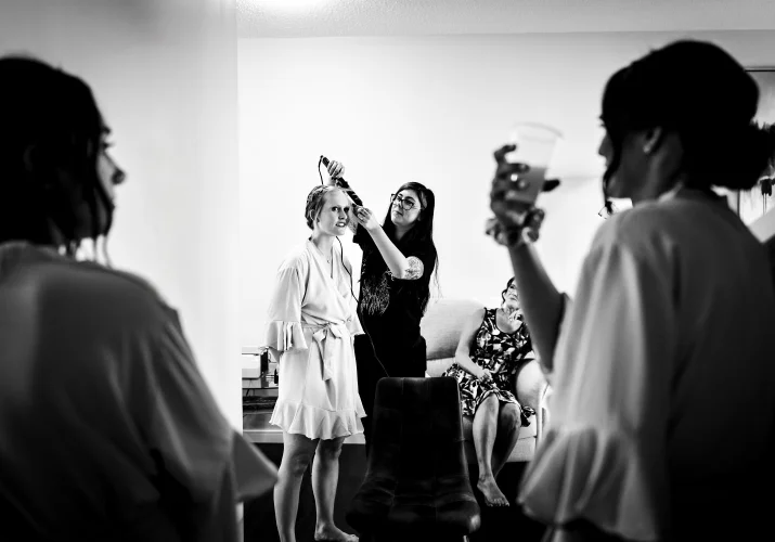Girls are getting ready before the wedding ceremony.