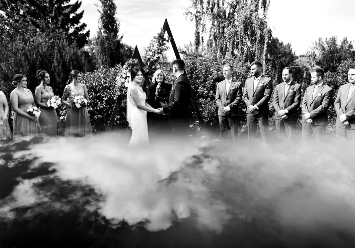 Calgary wedding ceremony in black and white with the reflection of the sky.