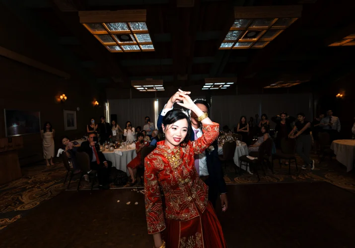 the groom spinning the bride during their first dance in Banff.