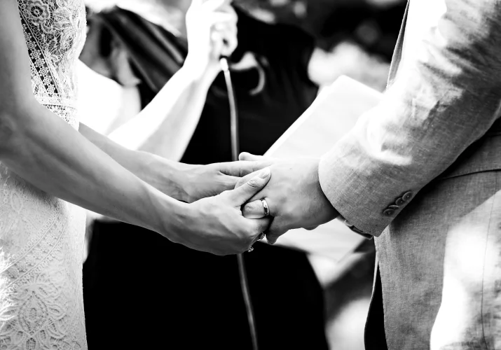 hands of the bride and groom.