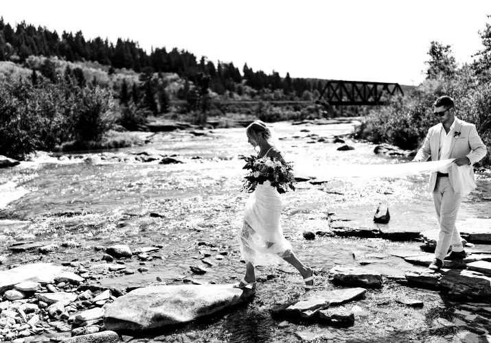 The bride crossing the river.