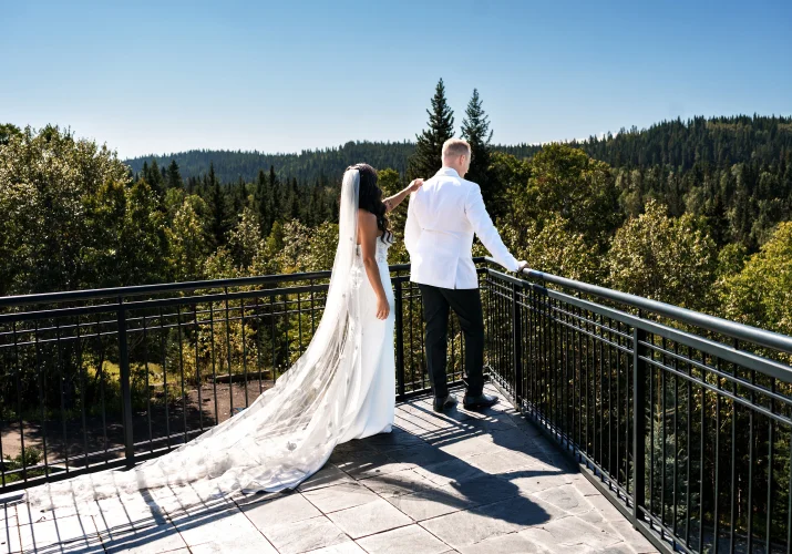 Calgary Wedding Photography of the bride standing behind the groom for the first look.