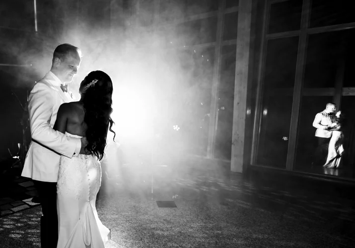 Calgary Wedding Photography In Black and White of the dancing bride and groom