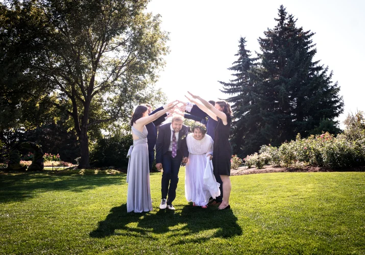 wedding party in Calgary made a tunnel that newlyweds have to pass through