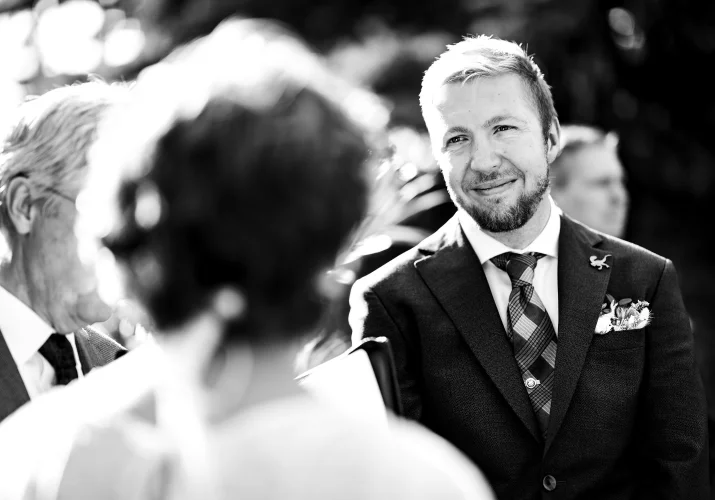 The groom look at the bride with love