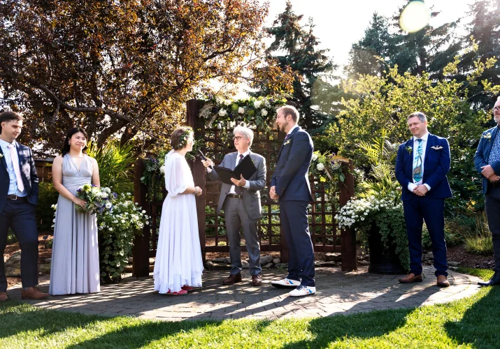 Bride and groom getting married at the Calgary Zoo