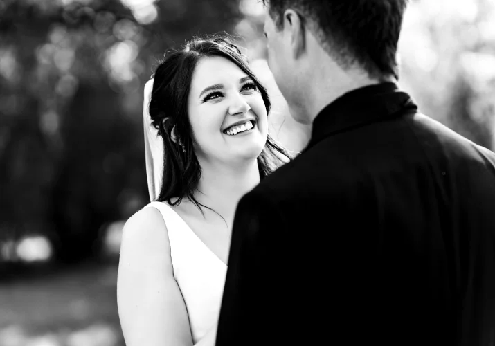 The bride look with love at the groom at the Calgary Wedding Ceremony