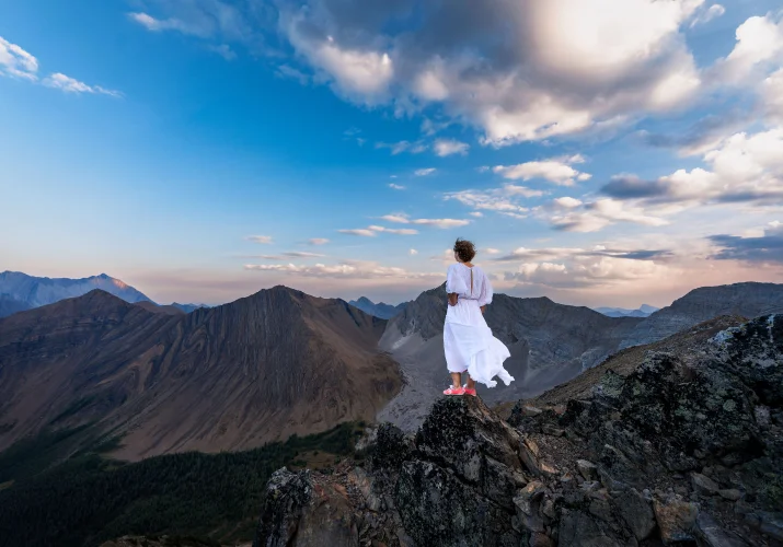 Banff wedding photography of the bride on the top of the mountain