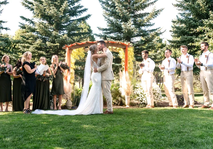 first kiss of the newlyweds in the park in Waterton