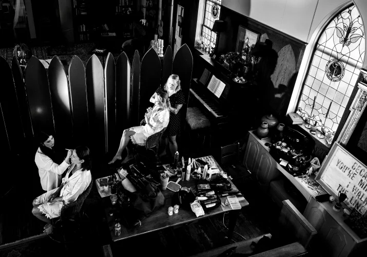 Getting readi time in black and white before wedding ceremony in Waterton. Photo taken y banff Wedding photographers from the balcony.