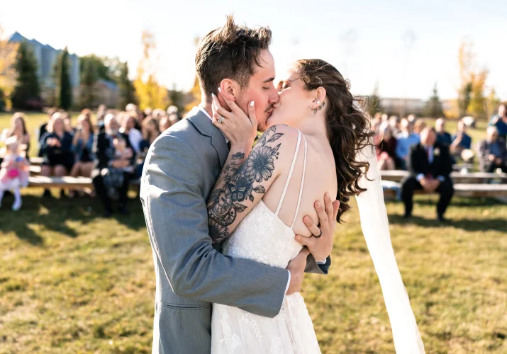 Calgary Wedding Photography of the bride and groom sharing a kiss.