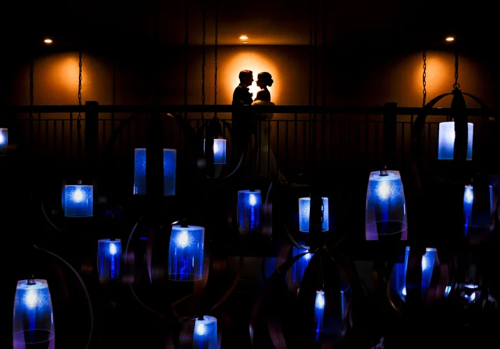 silhouetted couple in love against the wall.