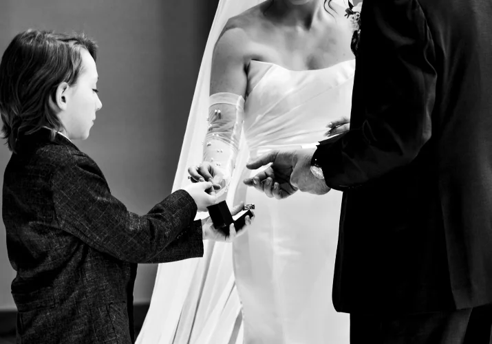 ring barrier passes the wedding rings on the Canmore Wedding Ceremony.