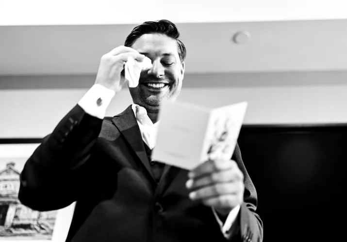 Groom wipes his eyes from tears before Canmore Wedding Ceremony