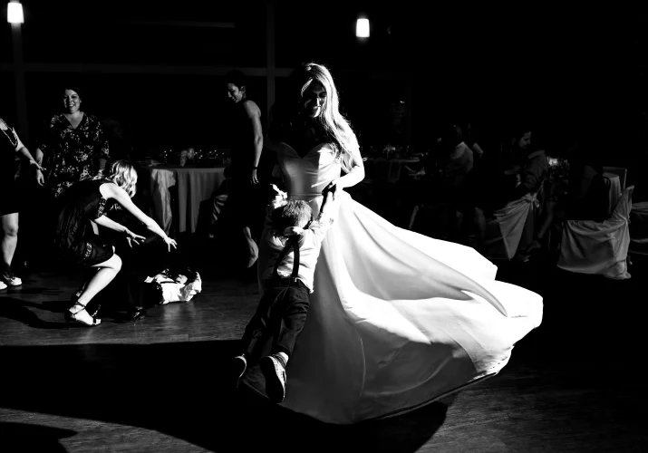 Bride dance with her little son at the wedding reception in Edmonton.