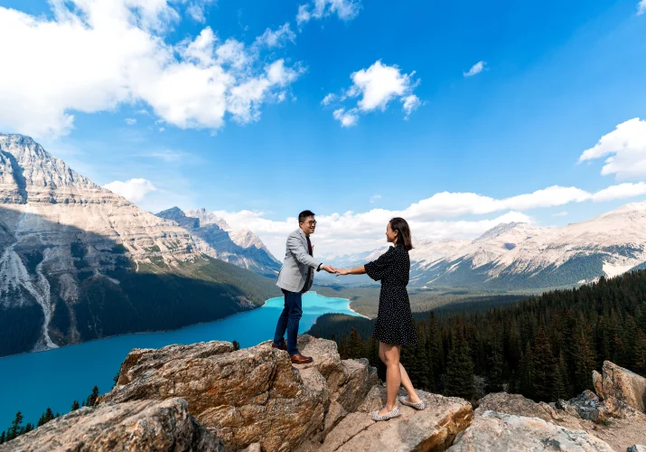 Couple in Love hikes at Peyto Lake in the Canadian Rockies