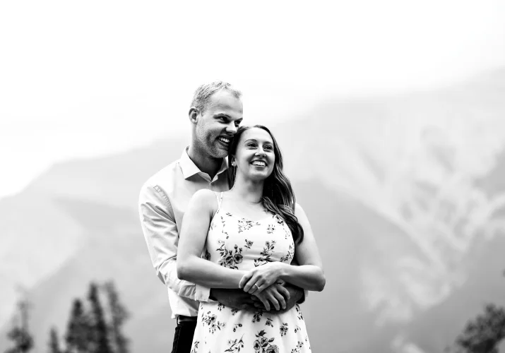Man hugs his wife to be