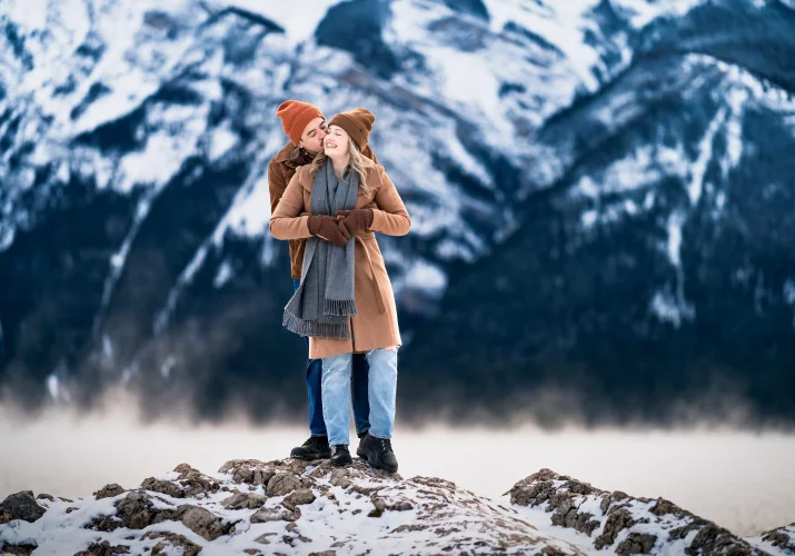 Engaged couple in a hug.