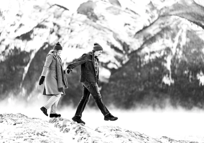 Coupe walks on the shore of the Minnewanka Lake