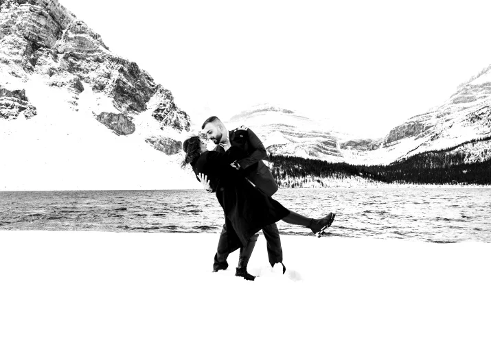 Lovers dance at Bow Lake during winter